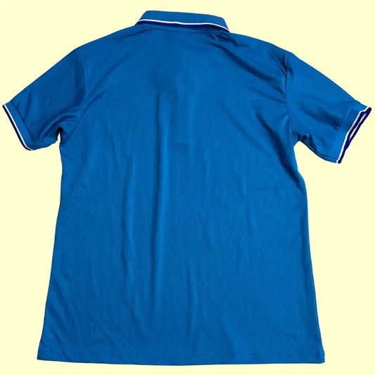 Bright blue polo shirt with a sporty yet casual vibe