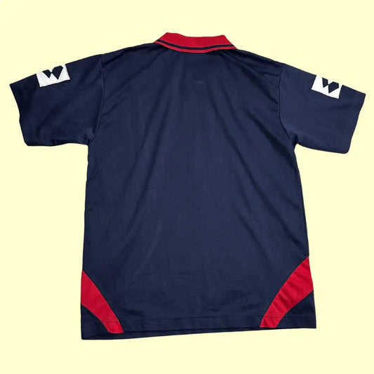 Vintage Lotto polo shirt in navy blue with bold red detailing