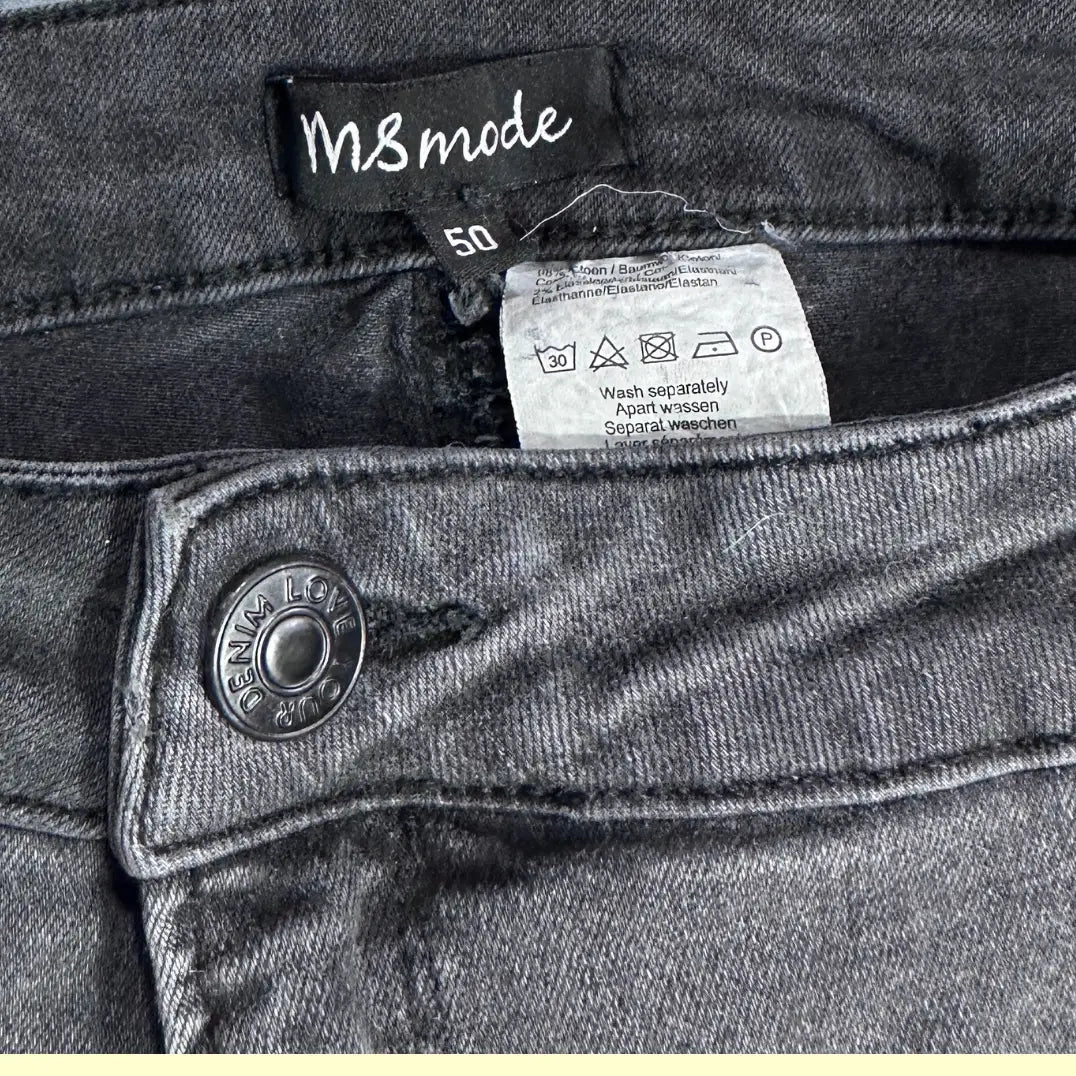 MS Mode black washed jeans with a modern distressed design