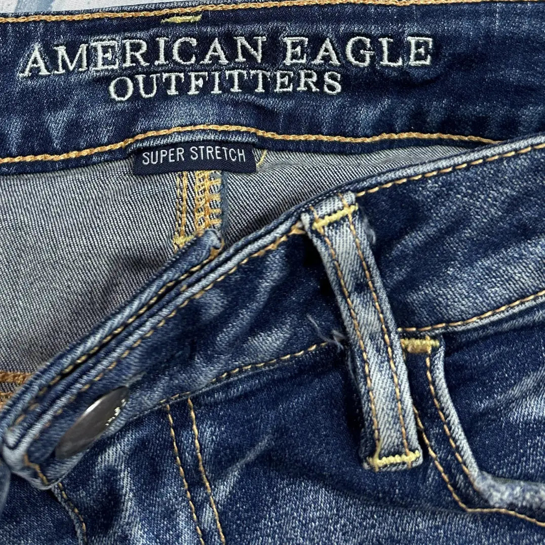American Eagle Outfitters Super Stretch Ripped Jeans in classic blue wash