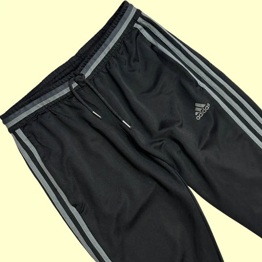 Adidas black track pants offer a stylish and comfortable look