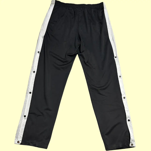 ACTIVE ®black jogging pants with white side stripes are perfect for both activewear and casual outings.