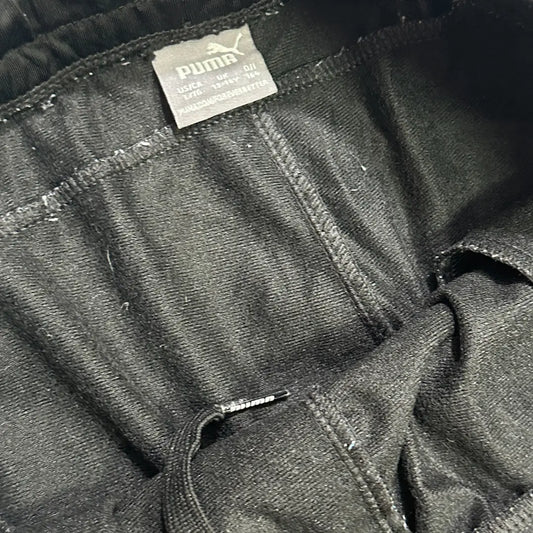 black Puma track pants are made from high-quality