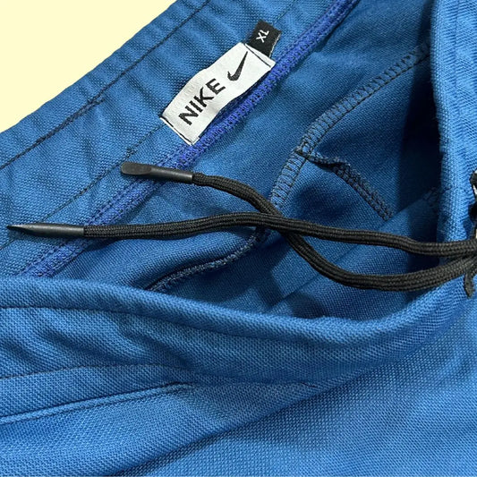 Nike blue track pants are perfect for both athletic wear and casual outings.