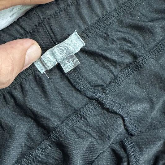 ELDYS black track pants offer a comfortable and stylish fit