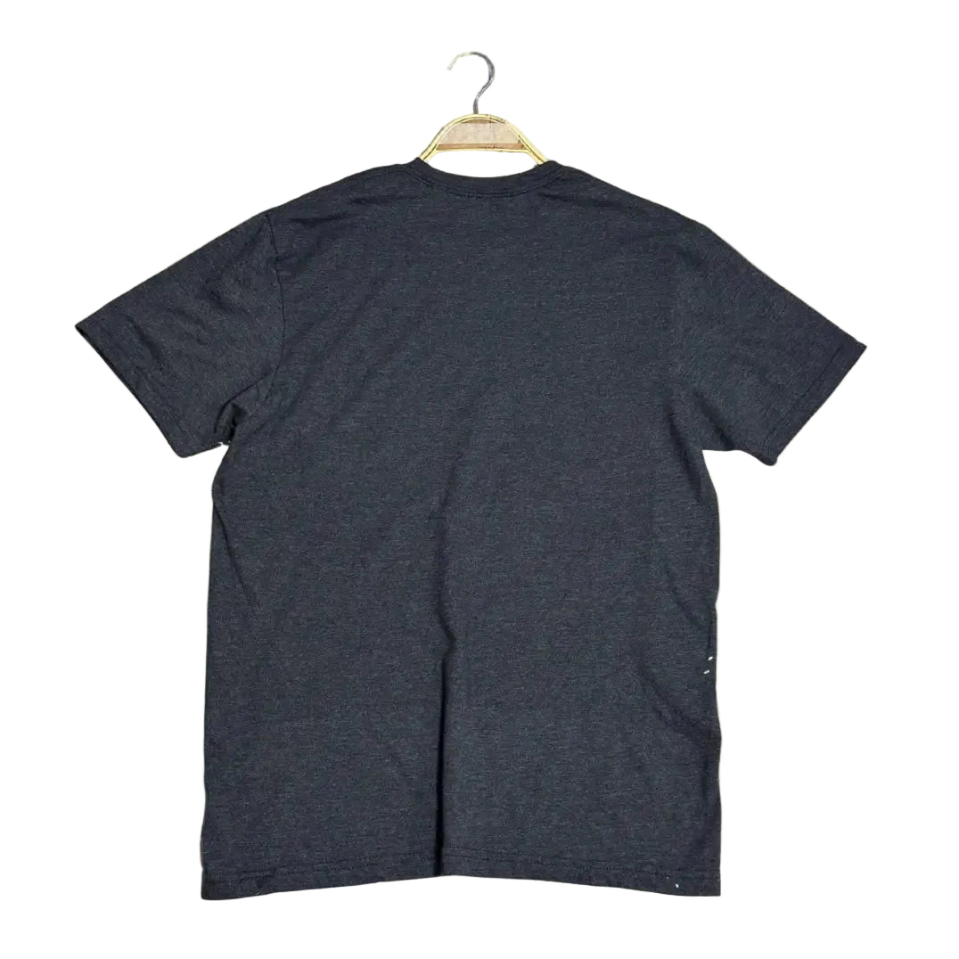 A trendy charcoal black T-shirt with a unique bleach-splatter effect