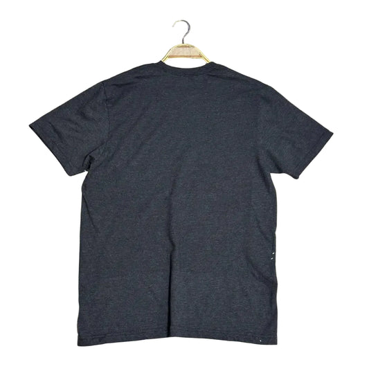 A trendy charcoal black T-shirt with a unique bleach-splatter effect