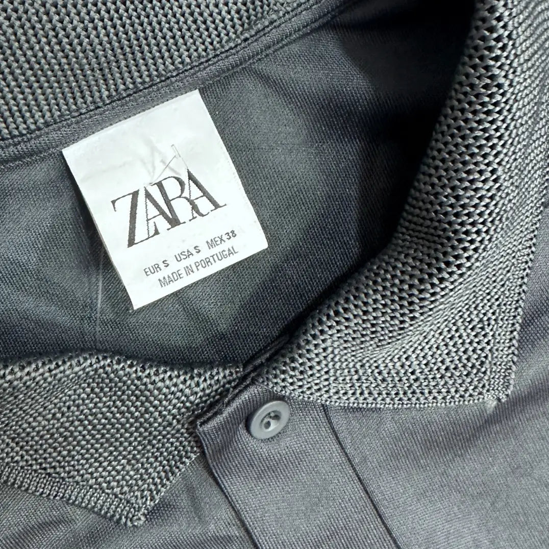 Classic black polo shirt from Zara, made in Portugal.