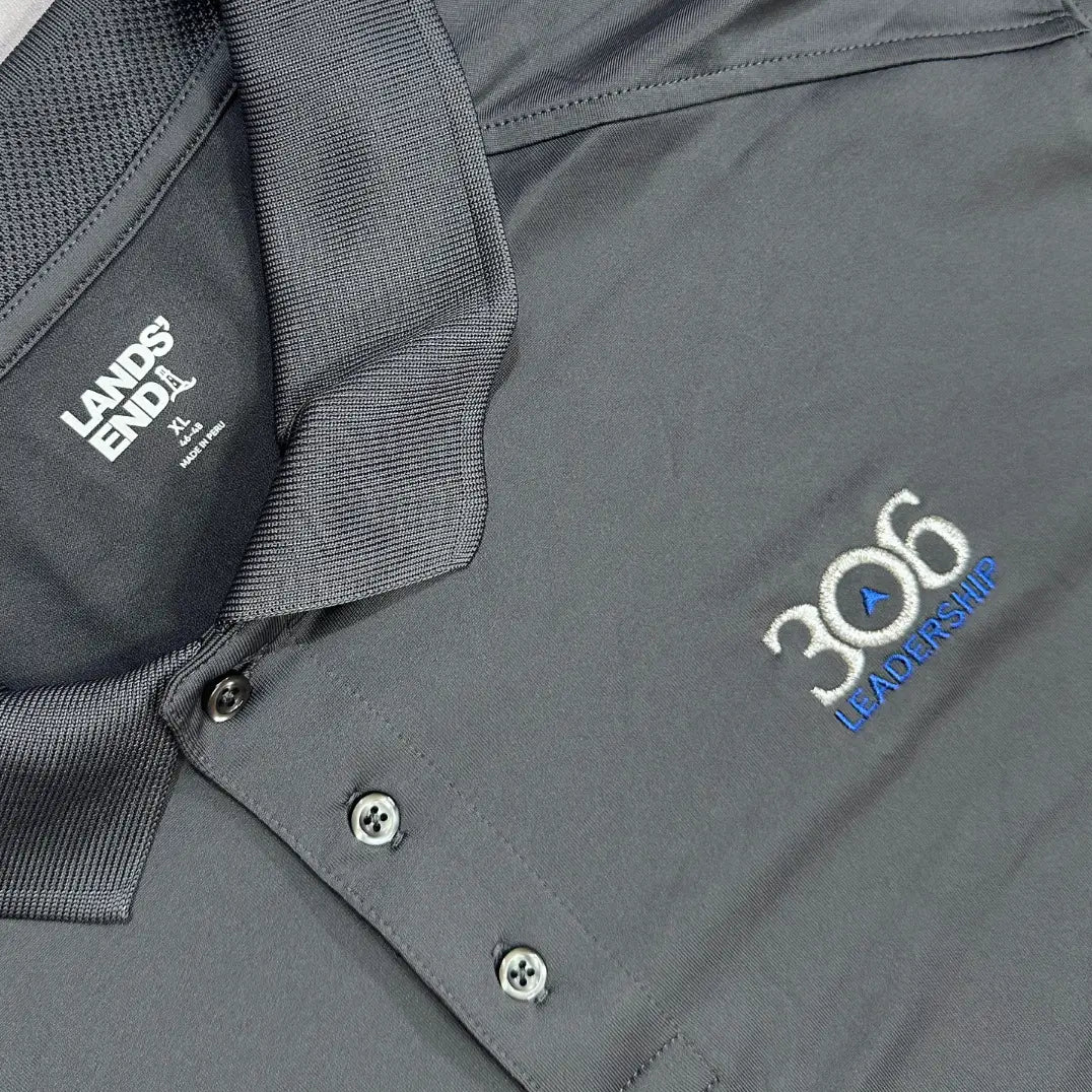 Lands’ End Performance Polo Shirt in dark gray with "306 Leadership" embroidery.