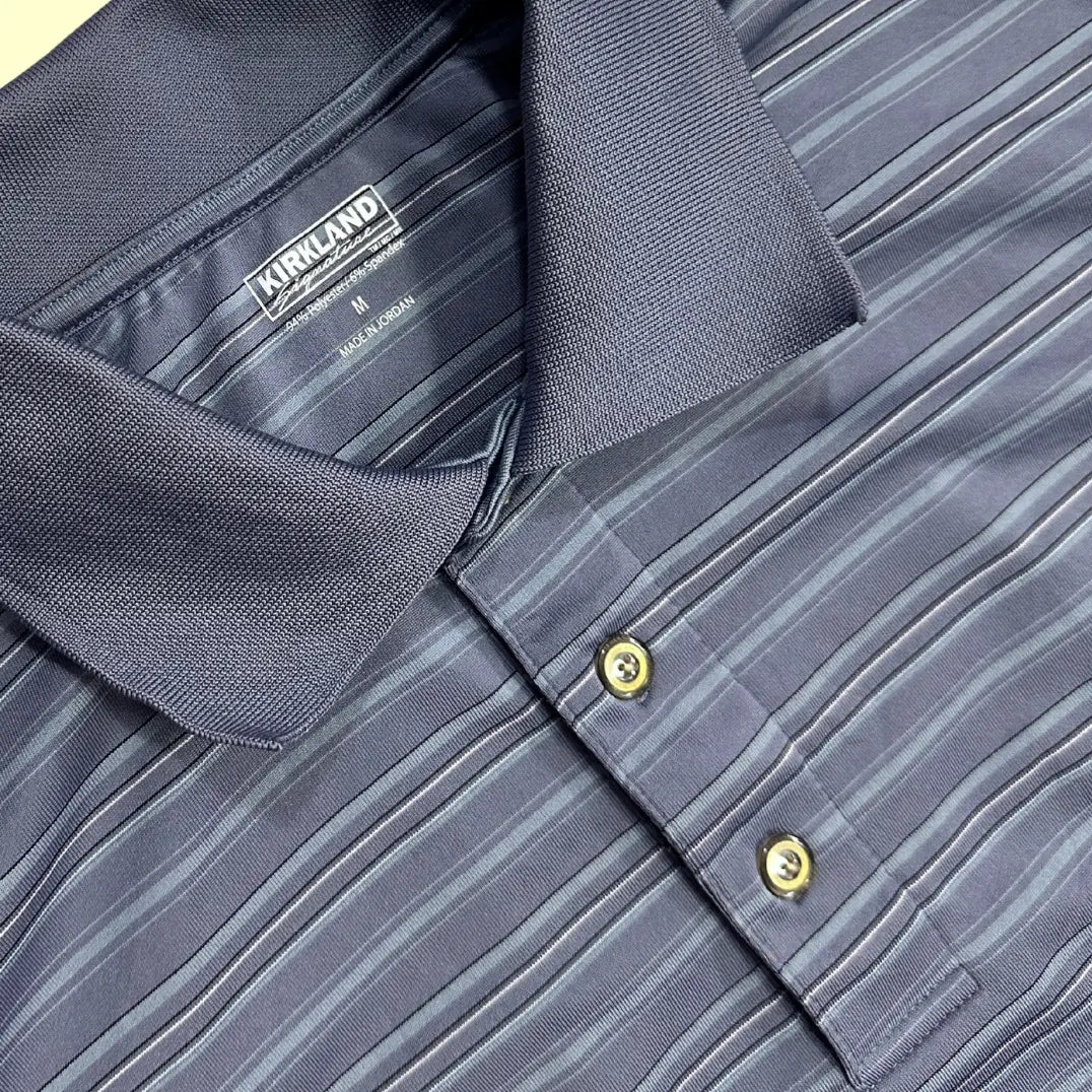 Kirkland Signature Striped Polo Shirt in navy blue with fine gray stripes.