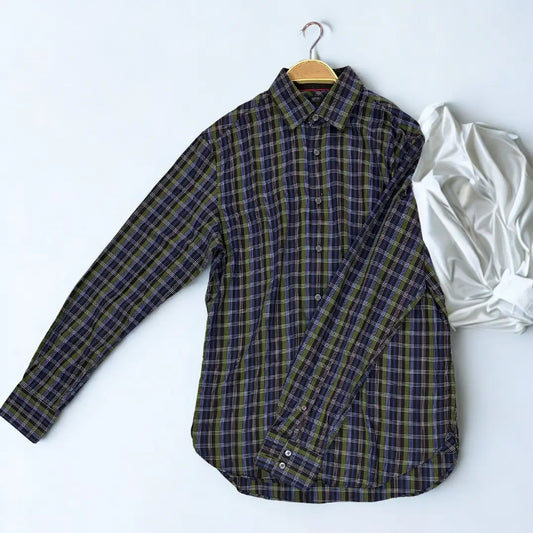 ESPRIT ®. It features a sophisticated plaid pattern with a modern color palette, combining shades of olive green, navy blue, and light blue on a dark background.