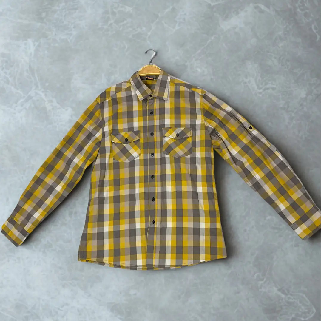 ACTIVE ®. It features a bold and modern plaid pattern in a striking color combination of mustard yellow, grey, and white