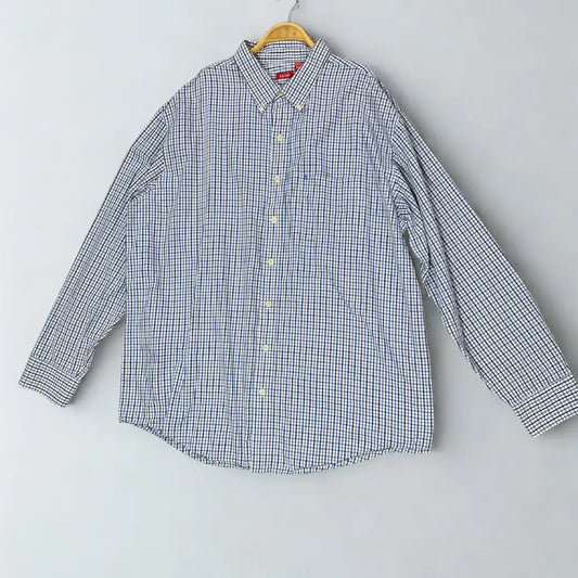 IZOD ®. It features a timeless and sharp graph check pattern, combining shades of blue and black on a crisp white background.