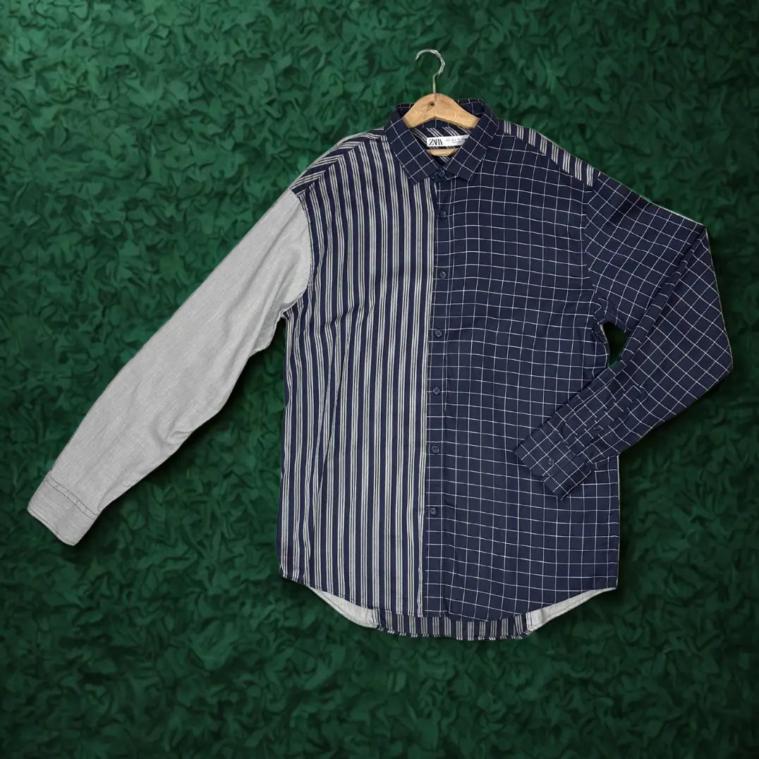 Zara ® It features a bold, deconstructed patchwork design