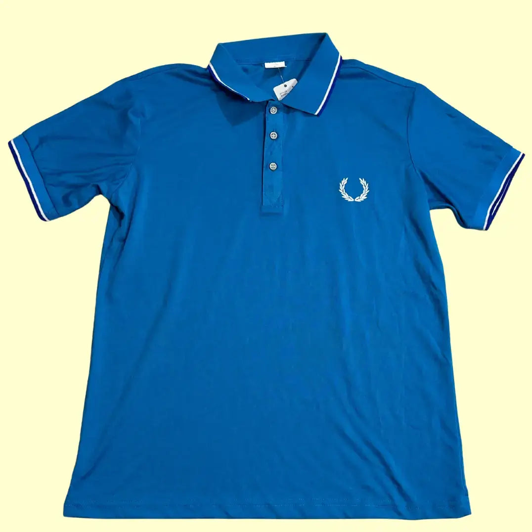 Bright blue polo shirt with a sporty yet casual vibe