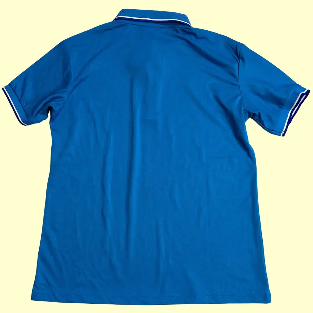 Bright blue polo shirt with a sporty yet casual vibe