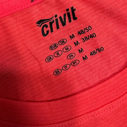 Bright red Crivit active T-shirt with a modern black striped chest panel for a sporty look.