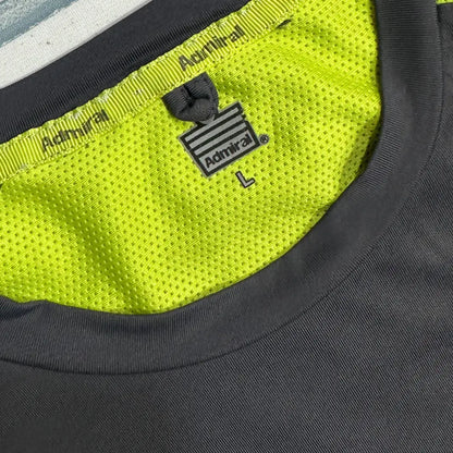 Admiral Sports Performance Tee in black with neon yellow mesh panels.