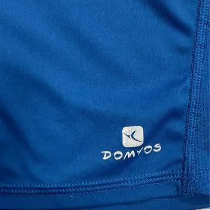 Domyos blue sports t-shirt with neon details and bold front text.