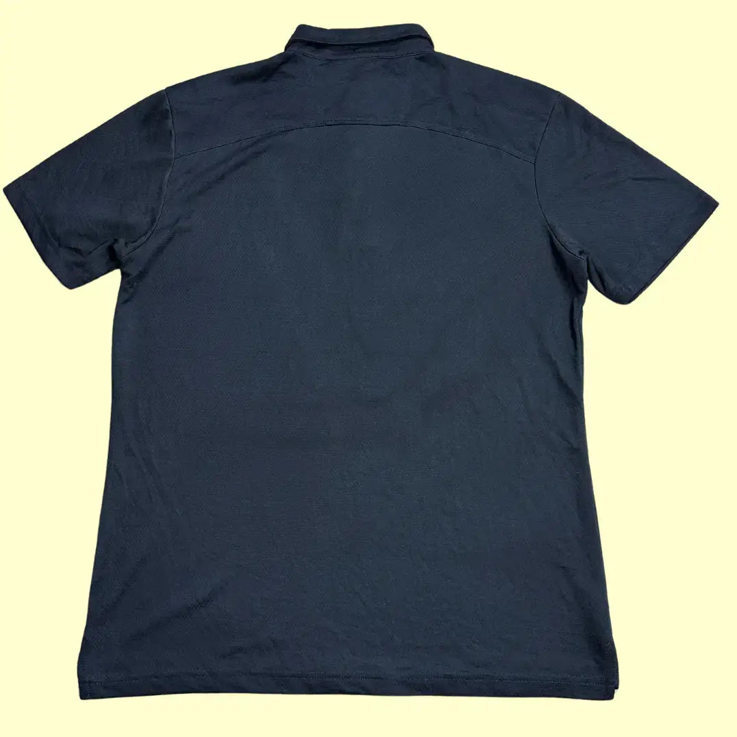 Winning Spirit classic black polo shirt.