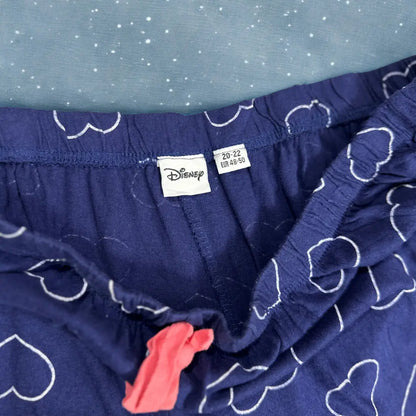 DISNEY® Blue pajama pants with a playful white heart outline pattern all ove
