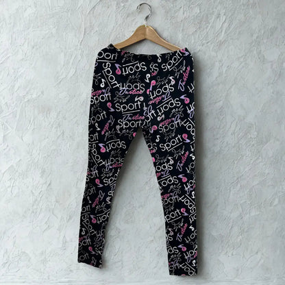 MISS OZIUS® Black leggings covered in playful white and pink text