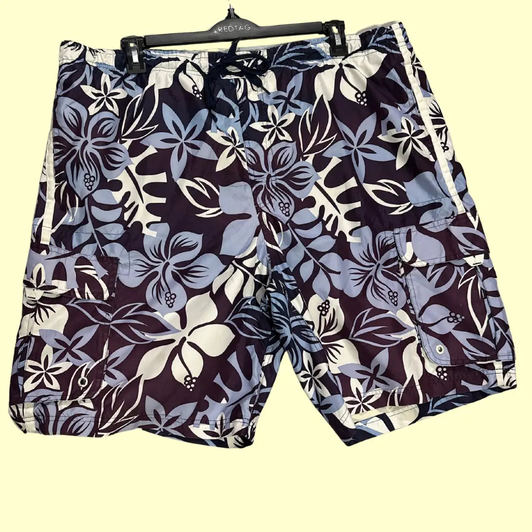 Old Navy ®floral print swim shorts in a tropical Hawaiian-inspired design.