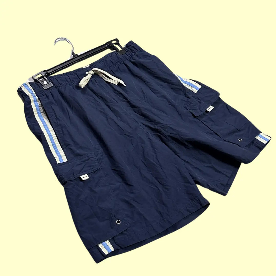 No Boundaries® navy blue cargo swim shorts with striped detailing on the sides and hems