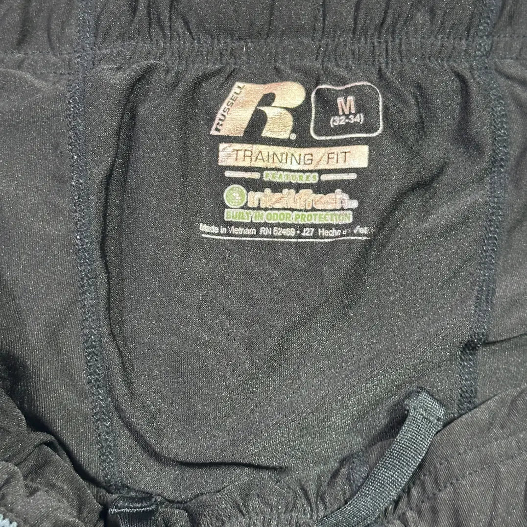Russell® Athletic Black Training Shorts with odor-protection technology.