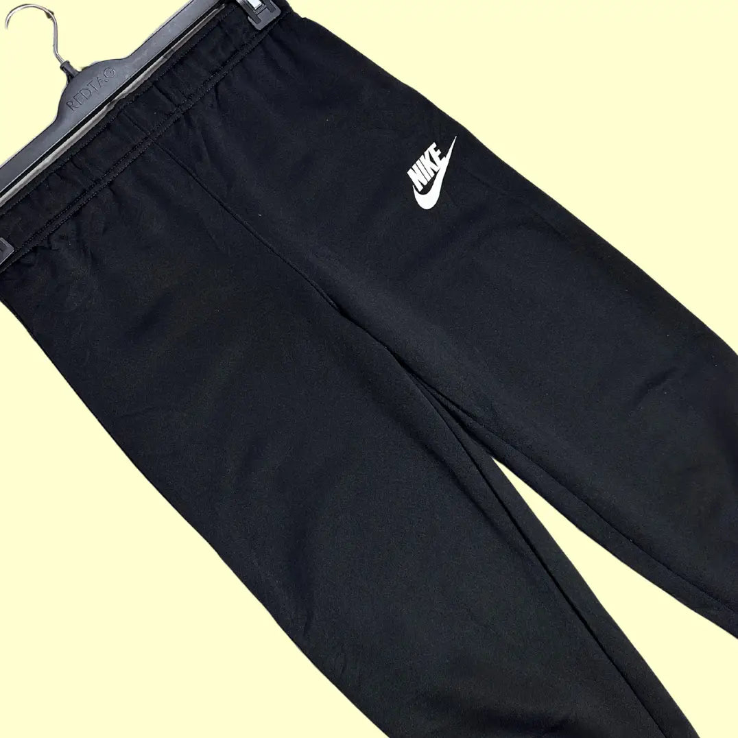 Nike black track pants combine sporty design with everyday comfort