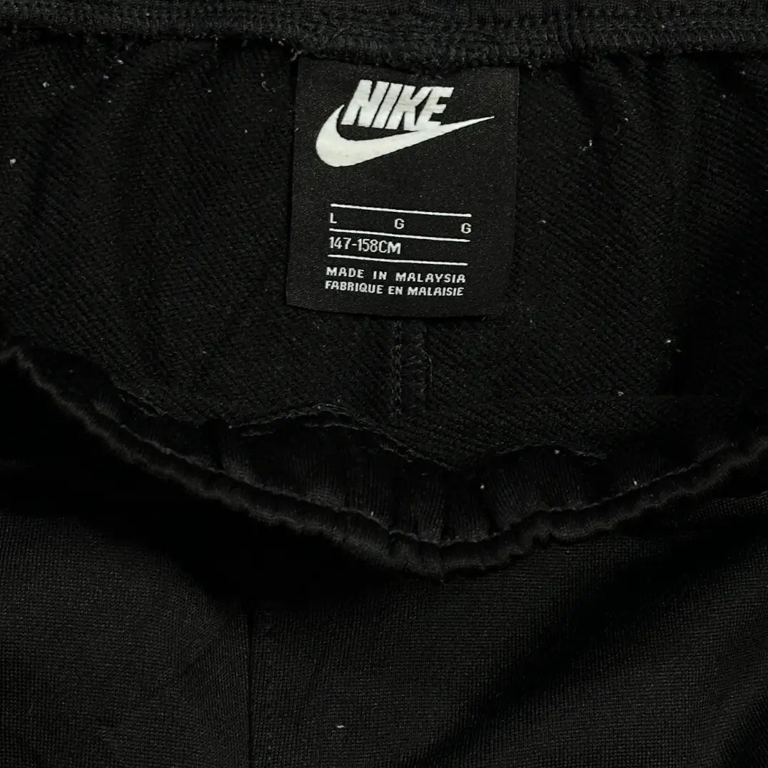 Nike black track pants combine sporty design with everyday comfort