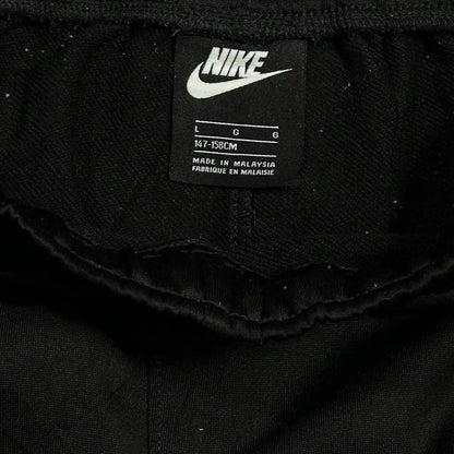 Nike black track pants combine sporty design with everyday comfort