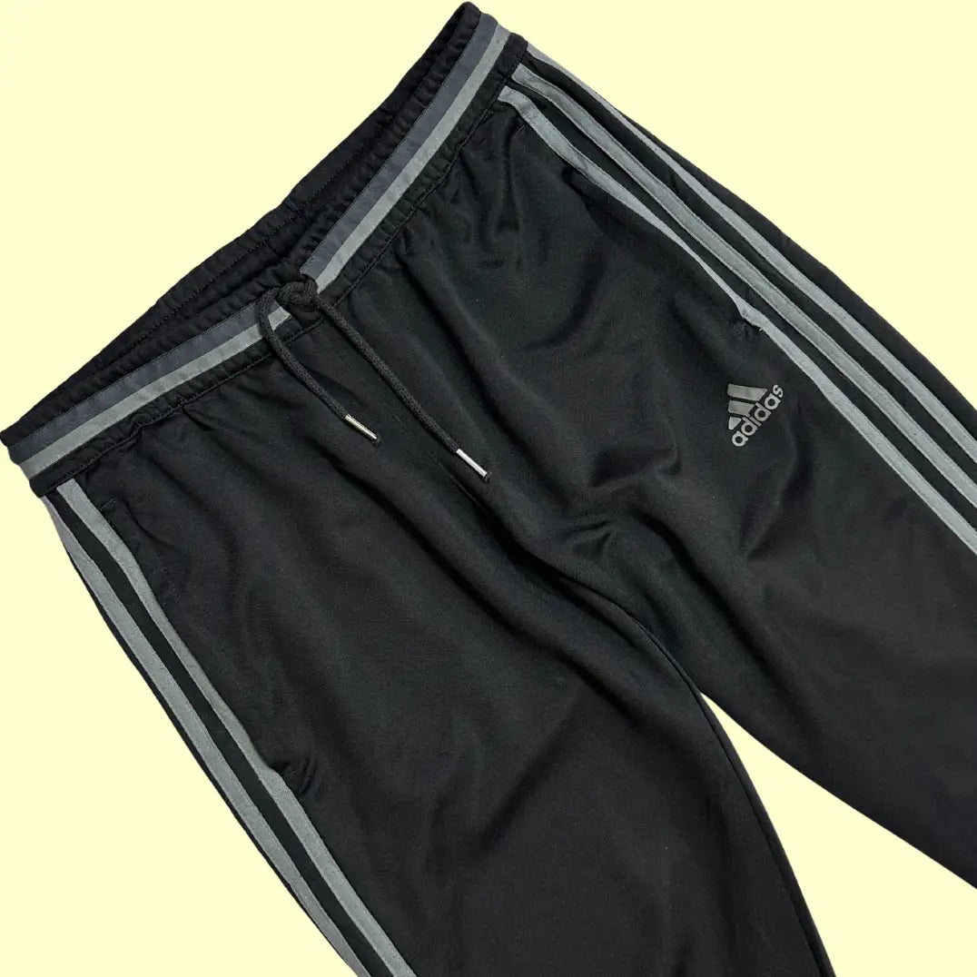 Adidas black track pants offer a stylish and comfortable look