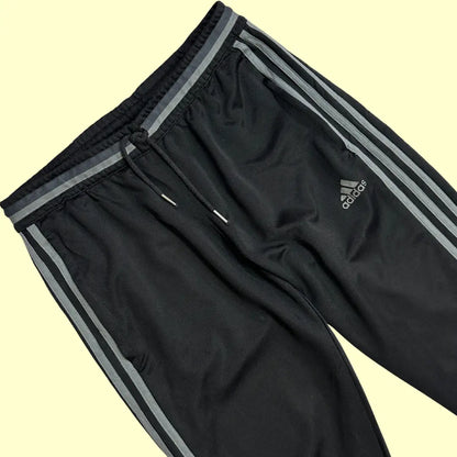 Adidas black track pants offer a stylish and comfortable look