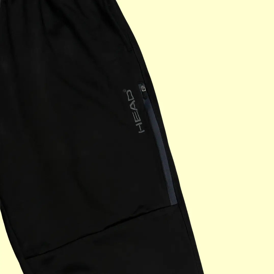 Head black track pants are designed for comfort and style.