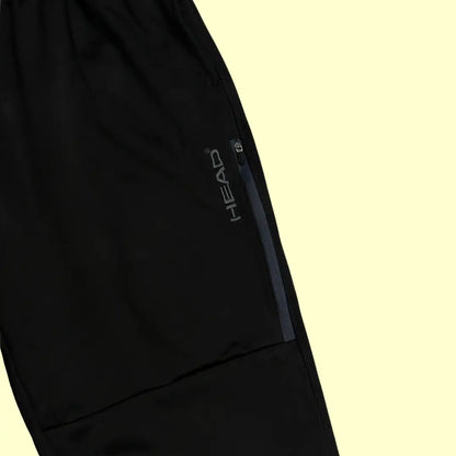 Head black track pants are designed for comfort and style.