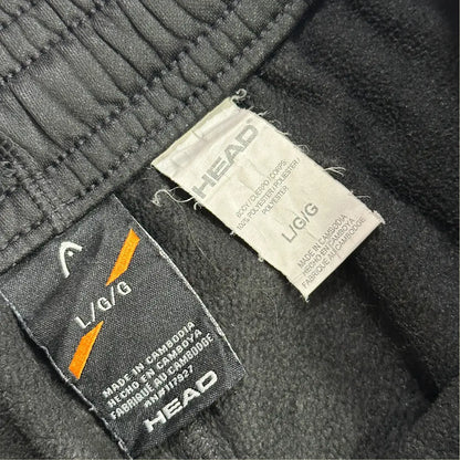 Head black track pants are designed for comfort and style.