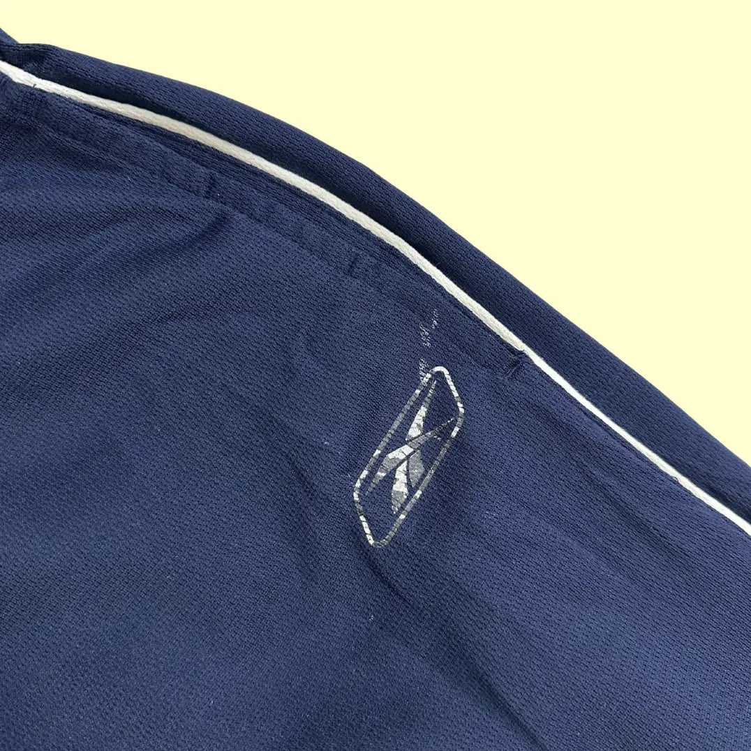 REEBOK  navy track pants are simple yet stylish with a sporty look