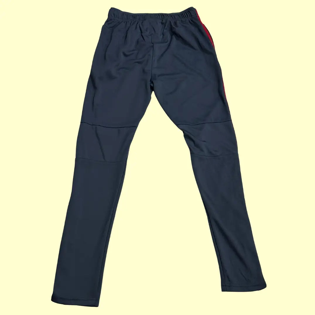Joma navy track pants feature a sporty design