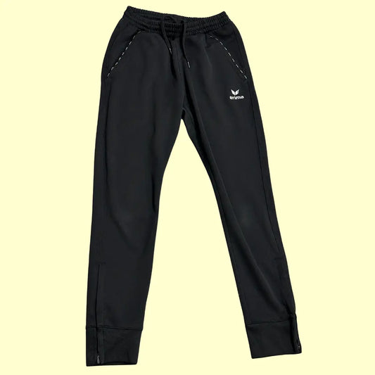 Erima black track pants are a sleek, versatile addition to any wardrobe