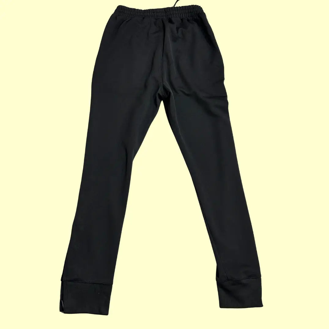 Erima black track pants are a sleek, versatile addition to any wardrobe
