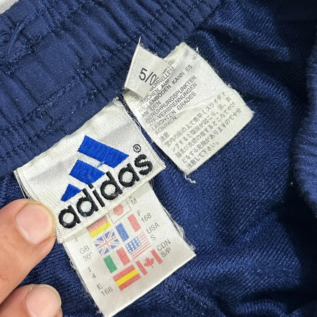 Adidas Navy Blue Track Pants with the signature 3-stripe design.