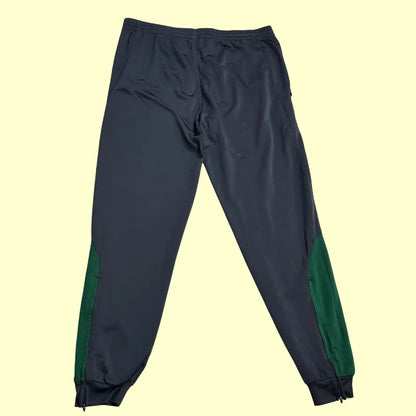 Adidas Rapid Wien Track Pants in dark grey with green side panels.