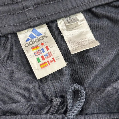 Adidas Rapid Wien Track Pants in dark grey with green side panels.