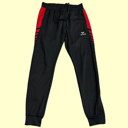 Erima Black Track Pants with striking red side panels and branding.