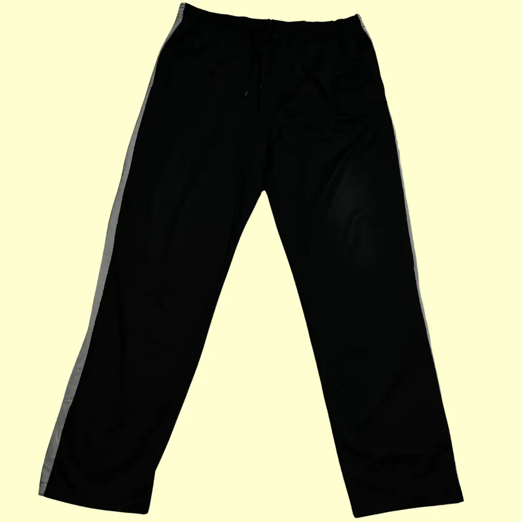 ACTIVE ®black jogging pants with white side stripes are perfect for both activewear and casual outings.