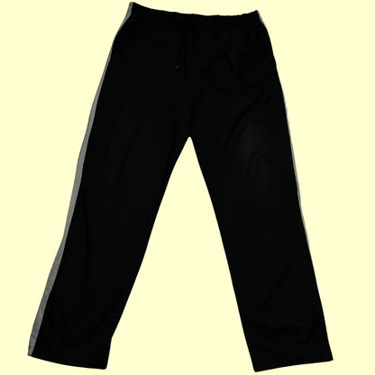 ACTIVE ®black jogging pants with white side stripes are perfect for both activewear and casual outings.