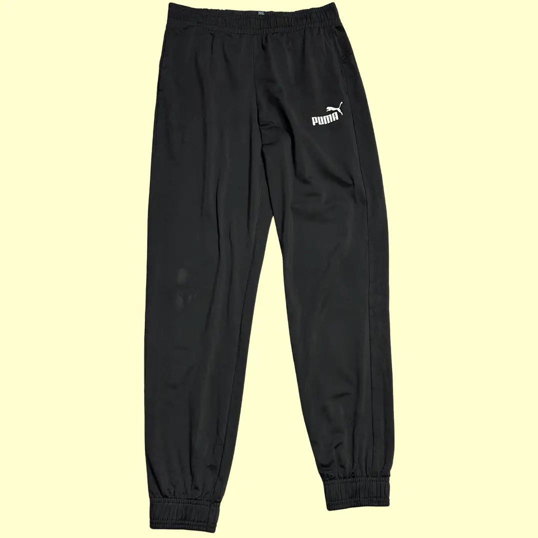 black Puma track pants are made from high-quality