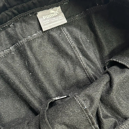 black Puma track pants are made from high-quality