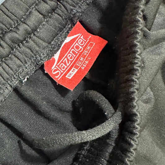 black track pants by Stazenger combine comfort and style.